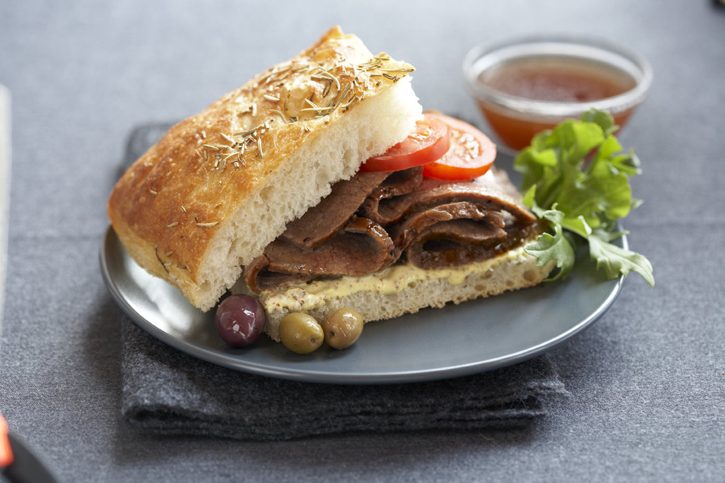 Cardinal Sous Vide Beef Pot Roast on a sandwich